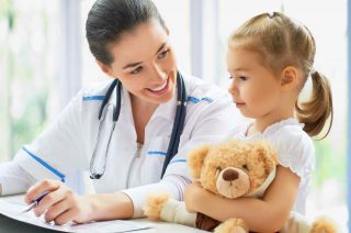 a doctor assessing the adhd and add needs of a child at kid care pediatrics